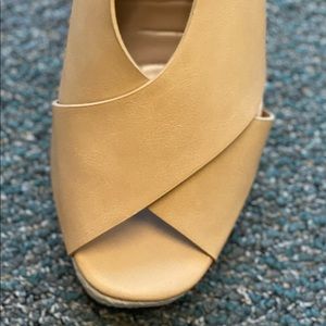 Boutique open toe wedge shoe
